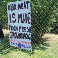 The sign is hung!  From the drive-thru lane.