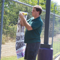 RBCP hanging the sign